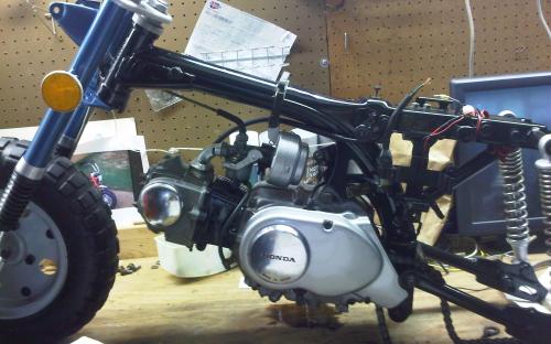 Engine mounted on the bike. Awaiting remaining parts before further assembly!