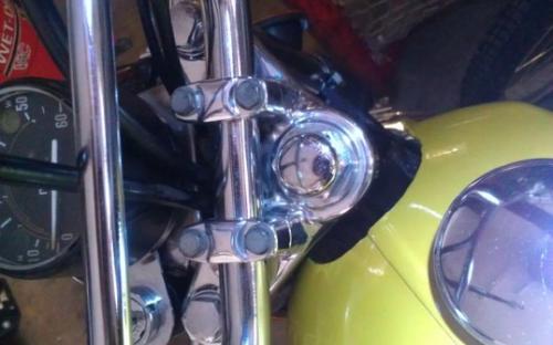 Gas cap and handlebar accessories done being polished. Still have the rest of the bike to do though.