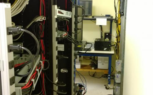 Server and data rack wiring complete. Safer isle for performing work now available.