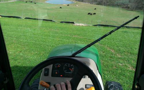 Mowing hillsides at the farm.
