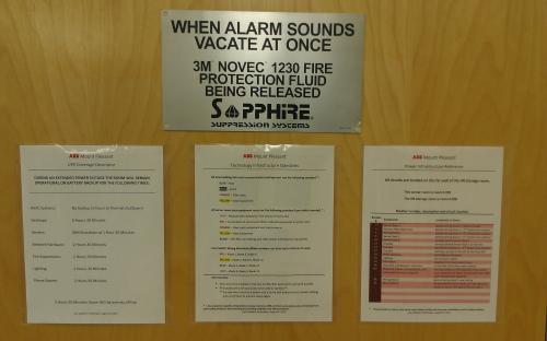 New fire system labeling from inside the room. Also shows room standards documentation.