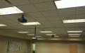 New far-throw projectors installed with wiring run through mounting pole for neatness.